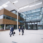 business-people-entering-office-building